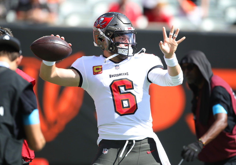 Buccaneers quarterback Baker Mayfield warms up before a game against the Bengals at Paycor Stadium