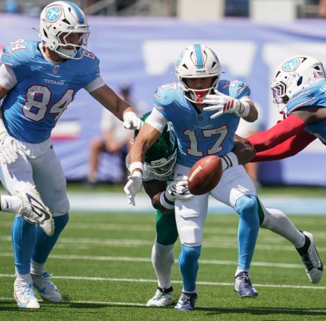 Titans wide receiver Elic Ayomanor fields a punt against the Jets at Nissan Stadium