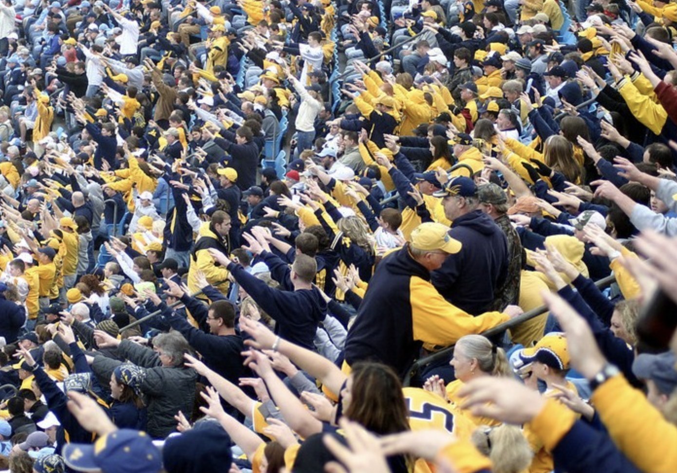 West Virginia Mountaineers fans performing the "1st Down" cheer