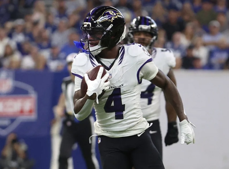 Zay Flowers catches a pass for the Ravens